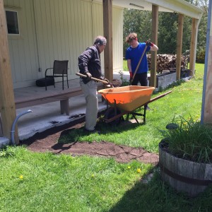 Touching up yard after construction was completed