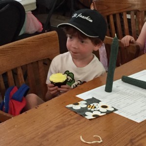 Rolling Candles and eating cupcakes - Bee Day